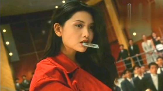 邱淑贞咬牌的壁纸