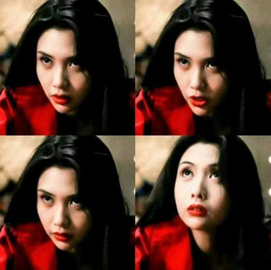 邱淑贞咬牌的壁纸