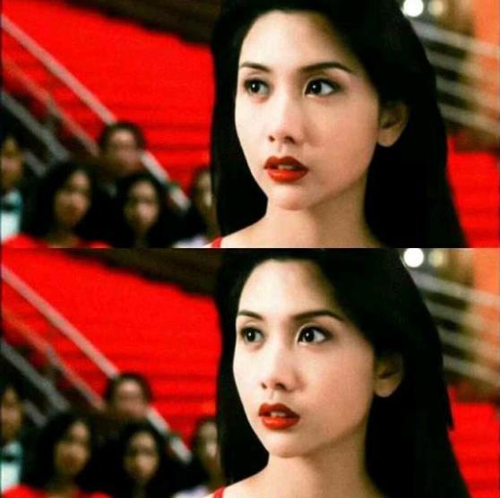 邱淑贞咬牌的壁纸