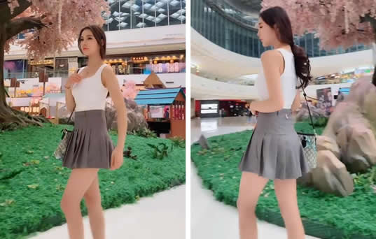 A字裙的小姐姐秀长腿：A字裙薄丝袜搭配令人感到甜美